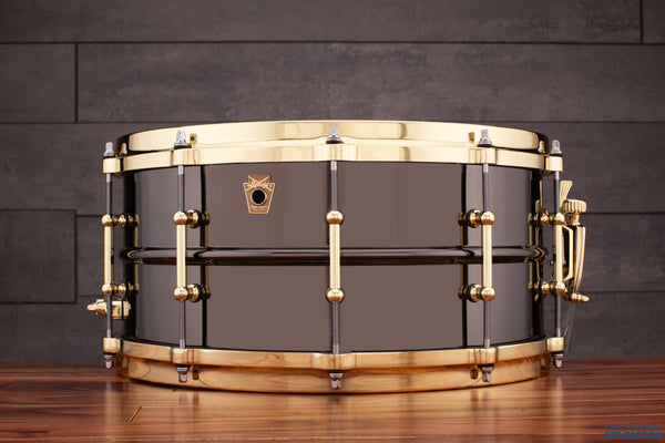 Here's a beautiful hammered brass shell outfitted with black hardware.  5x14; hammered brass. Buy now using the link in bio. #drums…