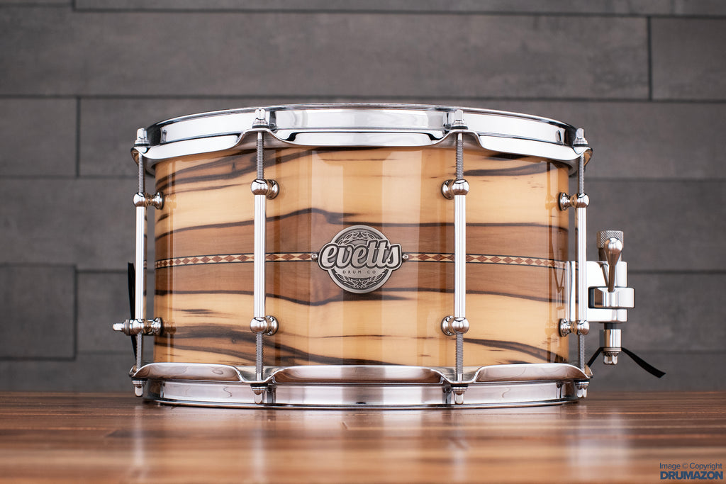 EVETTS 12 X 7 JARRAH SNARE DRUM, BLACKHEART SASSAFRAS GLOSS WITH INLAY