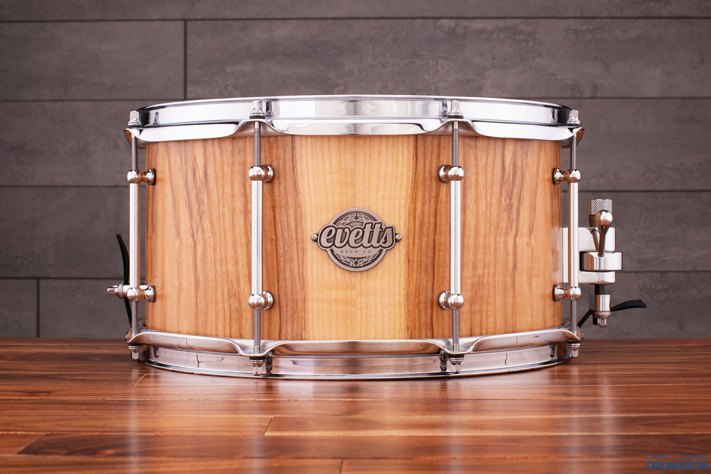 EVETTS 13 X 7 JARRAH SNARE DRUM, VERTICAL OLIVE ASH SMOOTH SATIN VENEER