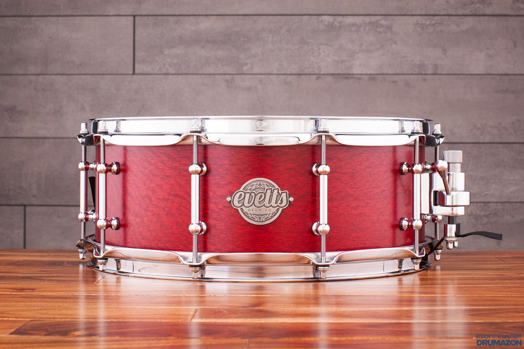 EVETTS 14 X 5.5 SPOTTED GUM SNARE DRUM, CHERRY RED STAIN OVER SILKY OAK SMOOTH SATIN VENEER